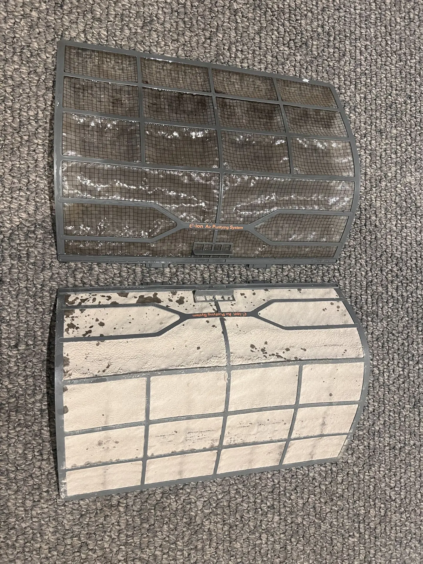 One clean, one dirty air con filter